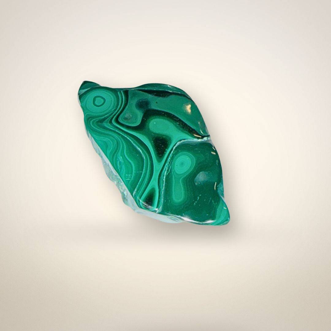 Smooth Malacholla Freeform specimen with rich green malachite swirls, perfect for collectors seeking harmony and clarity.