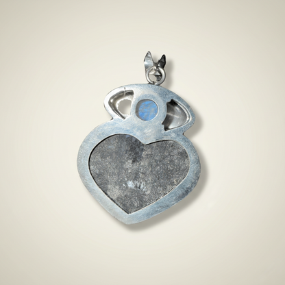 Rainbow Moonstone Evil Eye & Abalone Heart Pendant in sterling silver, featuring a heart-shaped abalone center and protective evil eye design.