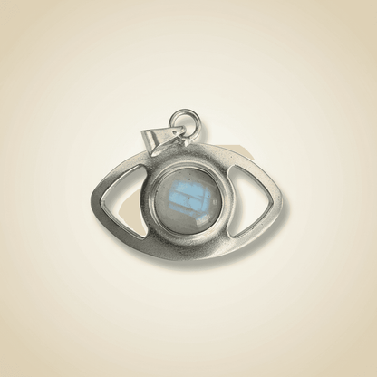 Rainbow Moonstone Evil Eye Pendant in sterling silver, featuring an oval moonstone center for protection and intuition. Ideal for spiritual jewelry lovers.