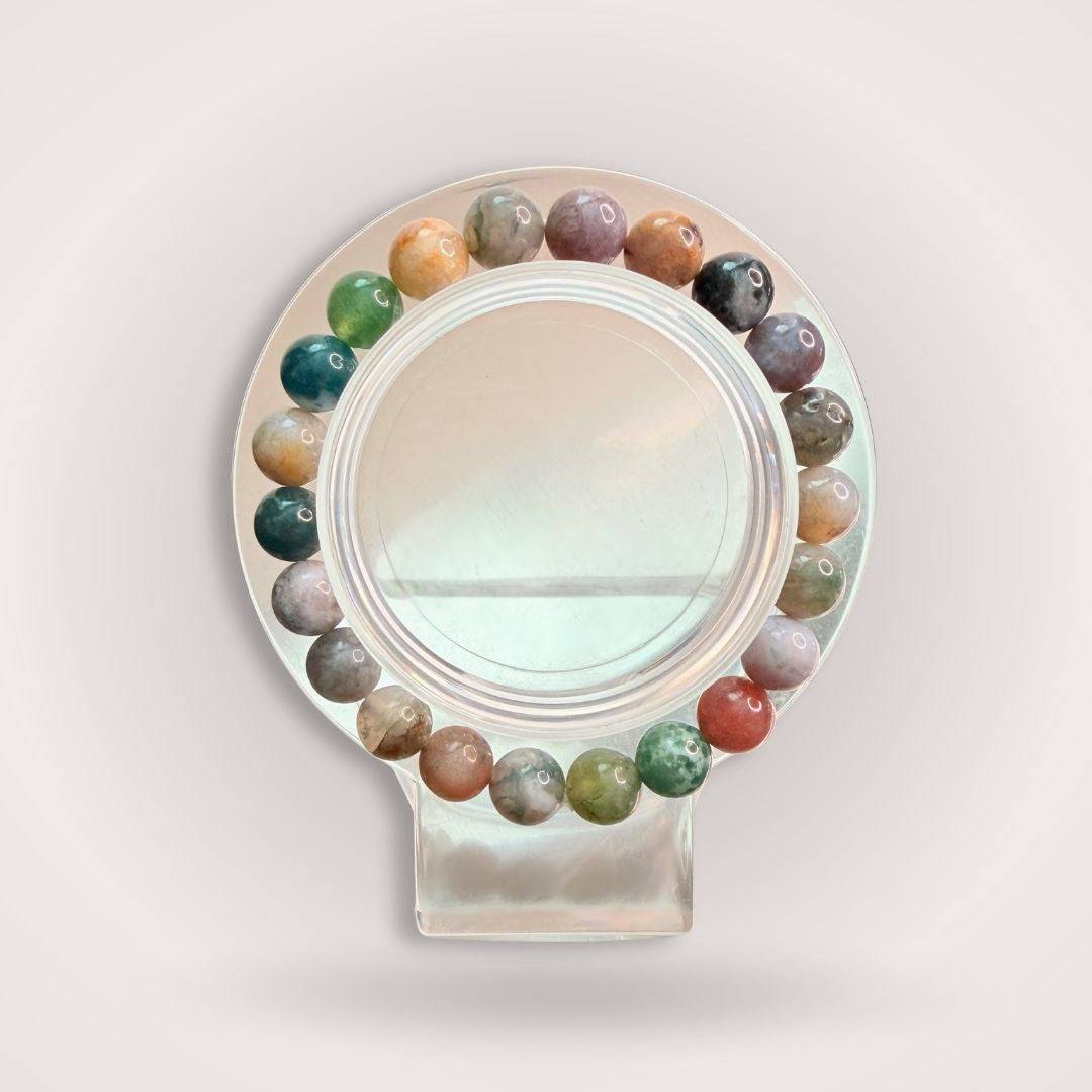 Rainbow Moss Agate Bracelet - Growth & Balance | 8mm Beaded bracelet featuring multicolored natural agate stones arranged in a circular display.