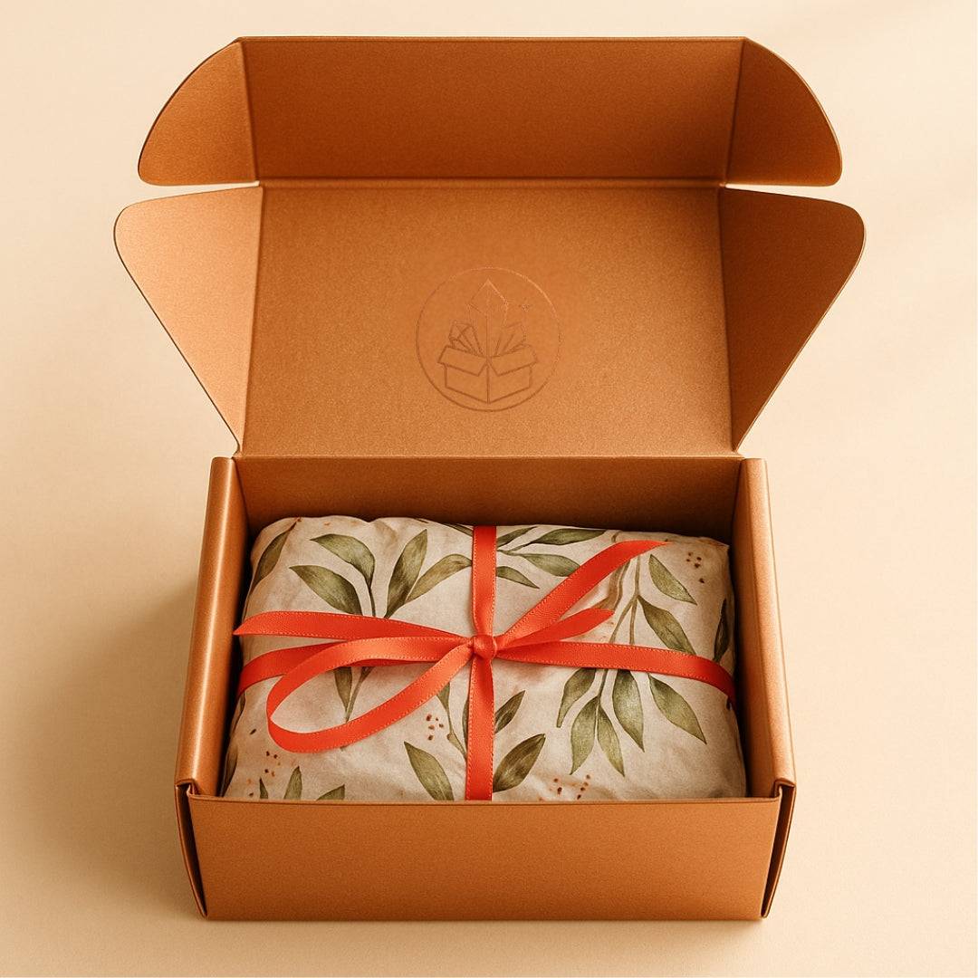 Mystic Parcel Mystery Gift for Purchase $10 or reward for $100+ purchase - Retail value $25. Copper gift box open with wrapped parcel inside