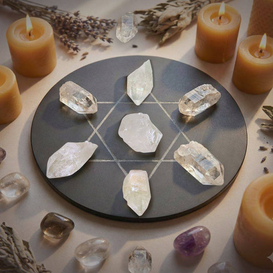 Clear Quartz Terminated Points arranged in a sacred geometry grid with candles and herbs, ideal for clarity, alignment, and spiritual rituals.