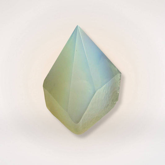 Opalite (Man-Made Glass) top polish point tower with smooth, translucent finish for clarity and decor. Ideal for home or meditation spaces.