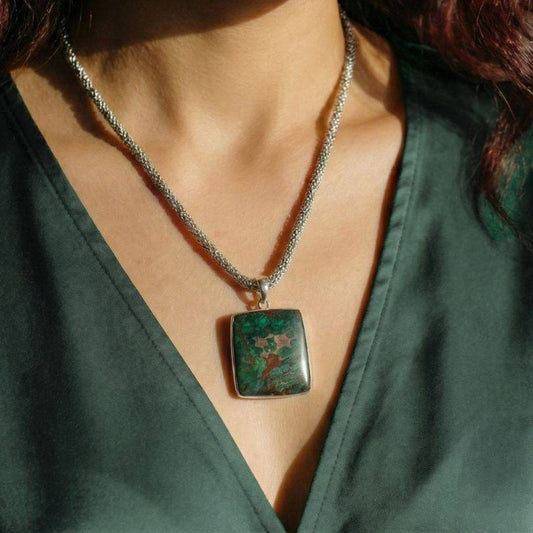 Chrysocolla Pendant for Calm & Heart Healing by Mystic Parcel, worn on a silver chain. Ideal for emotional balance and throat chakra alignment.