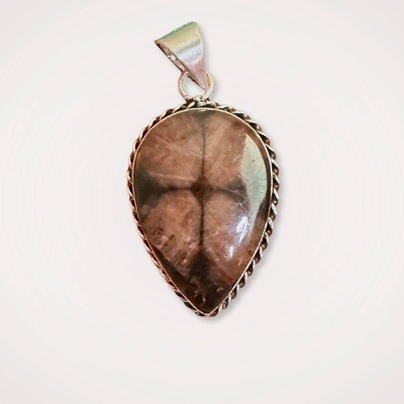 Close-up of Chiastolite pendant from the Thread of Companionship Aligned Pairing | Friendship Jewelry Set, showcasing its natural cross pattern in a teardrop shape.