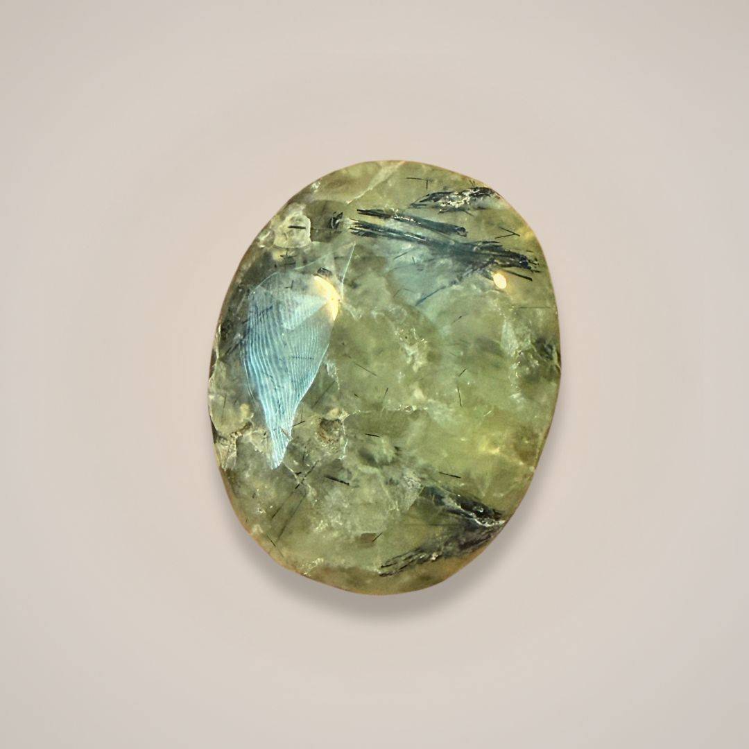 Close-up of polished Prehnite palm stone