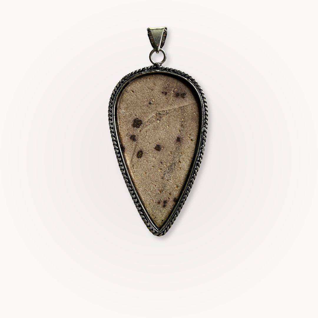 Back view of Psilomelane Jasper Pendant showing natural stone texture and polished finish, emphasizing its one-of-a-kind design.