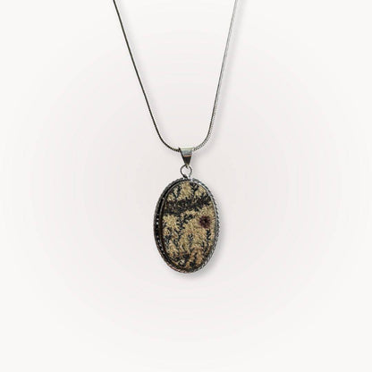 Psilomelane Jasper Pendant - Grounding talisman with unique dendritic patterns on silver chain. Ideal for self-awareness and protection.
