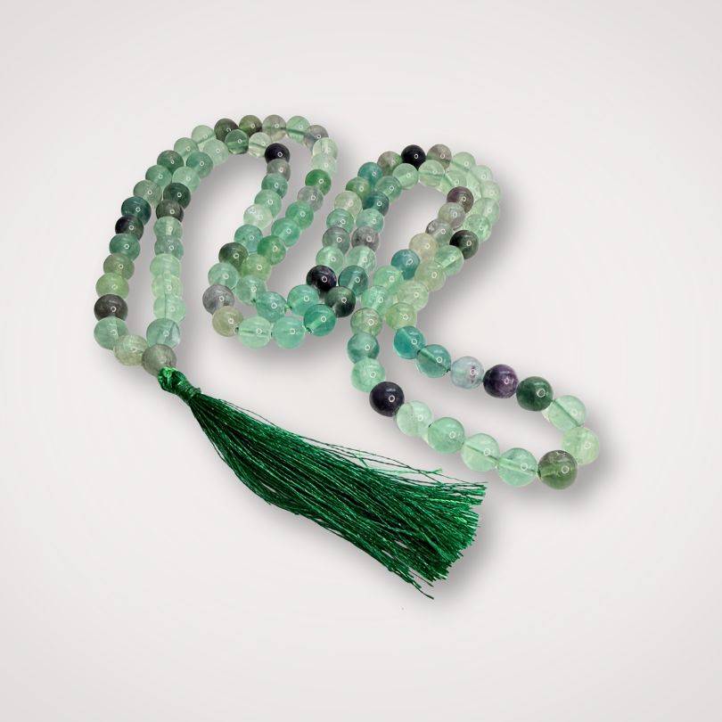 Rainbow Fluorite Mala Beads - Clarity Focus | 108 beads, 8mm with green tassel, ideal for meditation and spiritual rituals.
