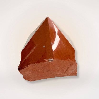 Red Jasper Top Polish Natural Sided Point tower with polished peak and raw base, ideal for grounding and stability in gemstone collections.