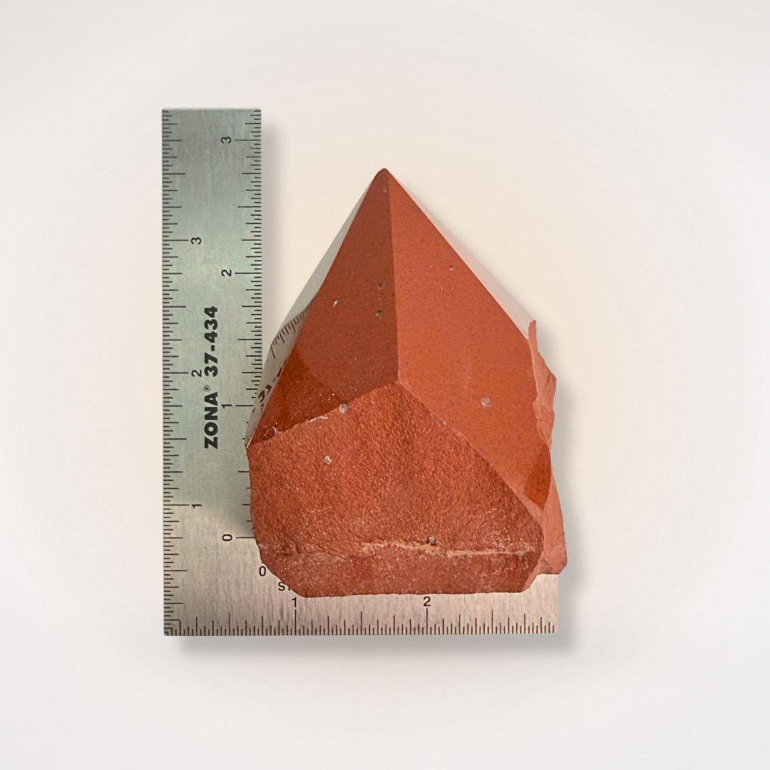 Red Jasper Top Polish Natural Sided Point tower measured against ruler, highlighting size and detail for gemstone collectors and hobbyists.