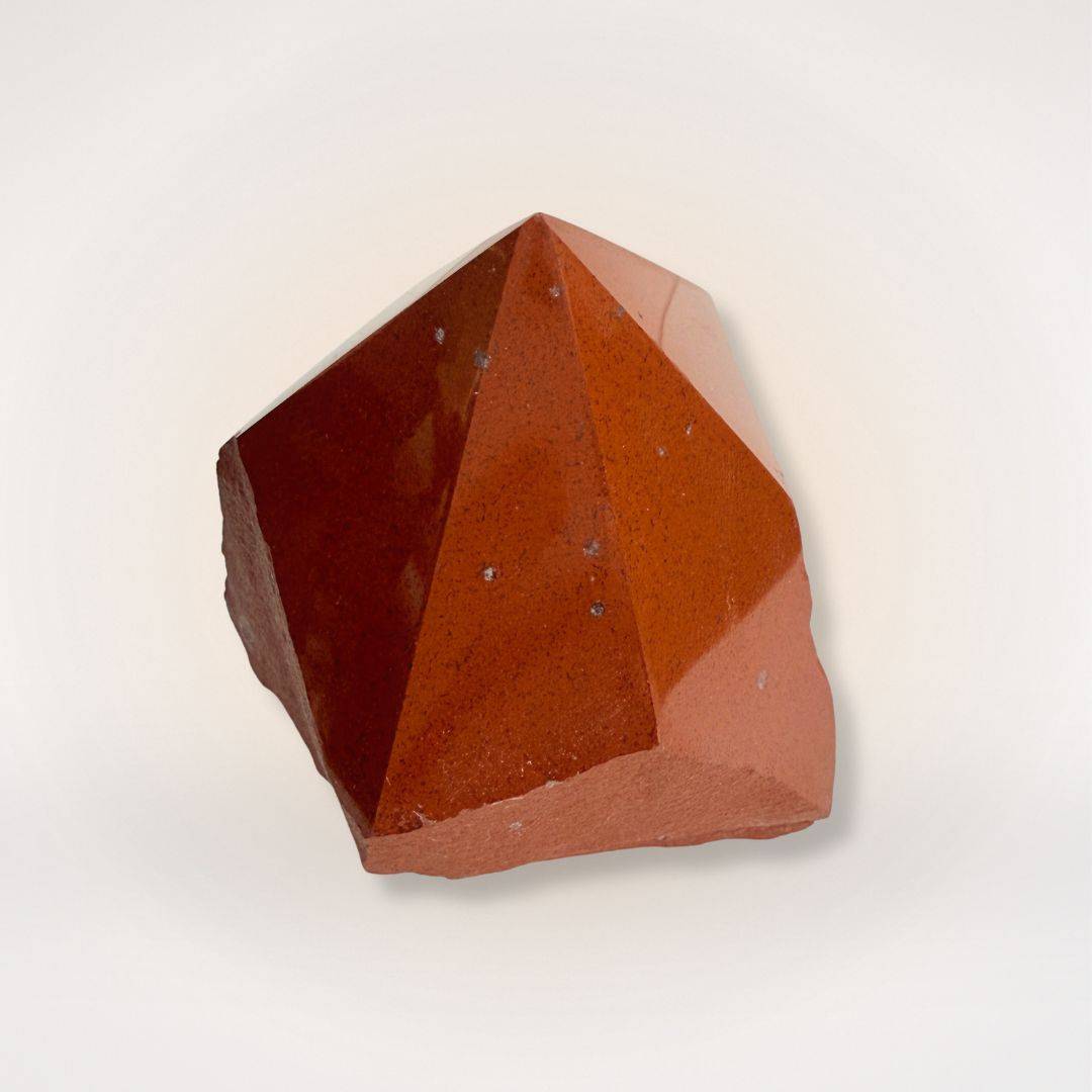 Polished Red Jasper Natural Sided Point tower showcasing deep red hues and grounding energy, perfect for collectors and healing practices.