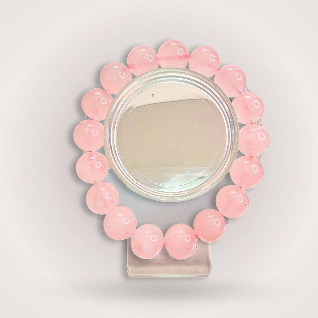 Rose Quartz bracelet from Bond of the Heart aligned pairing, featuring polished pink beads symbolizing emotional harmony and love.