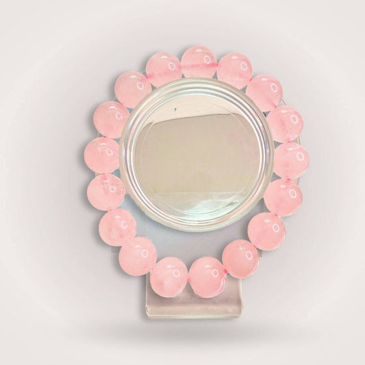 Rose Quartz bracelet from Bond of the Heart aligned pairing, featuring polished pink beads symbolizing emotional harmony and love.