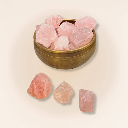 Collection of Raw Rose Quartz Crystals in a brass bowl with loose stones, perfect for heart chakra work, healing rituals, or DIY crystal crafts.