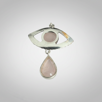 Rose Quartz Evil Eye Drop Pendant in Sterling Silver featuring a teardrop-shaped rose quartz stone hanging from an open eye design. Ideal for love and protection jewelry.