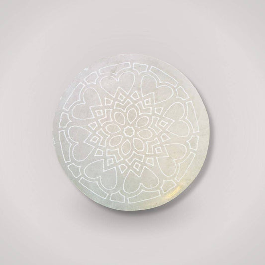 Selenite Charging Plate with engraved mandala design for cleansing rituals and energy reset. Ideal for crystal recharging and spiritual decor.