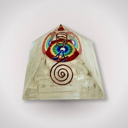 Selenite Rainbow Orgonite Pyramid with copper spiral and rainbow symbol, ideal for clarity and energy alignment in home decor or ritual use.