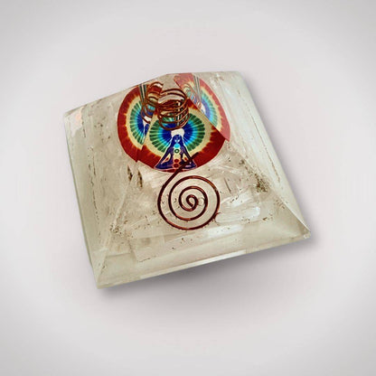 Handcrafted Selenite Rainbow Orgonite Pyramid featuring dual copper coils and vibrant rainbow design, perfect for energy healing and decor.
