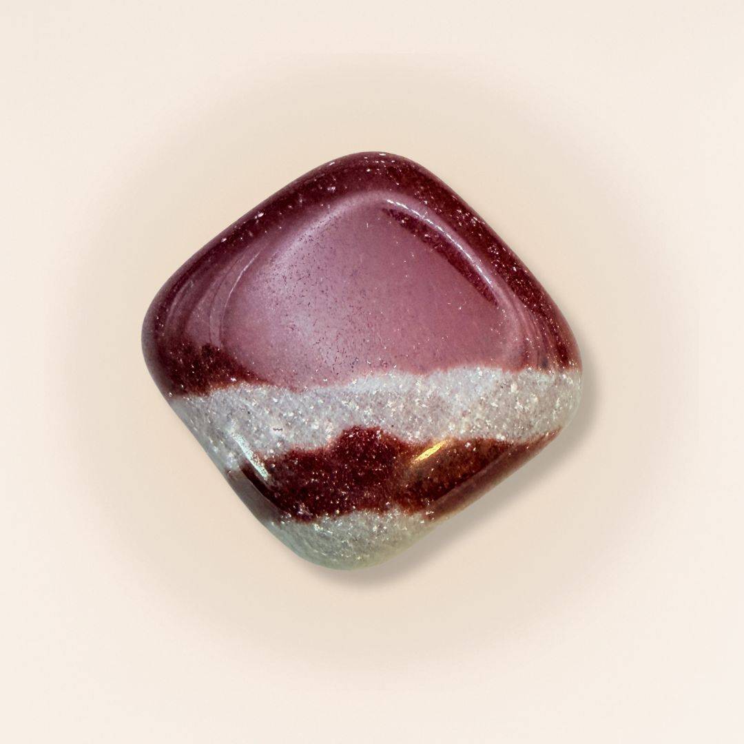 Shiva Lingam Cube tumbled stone with maroon and beige bands, symbolizing sacred balance and vitality in collectible rocks.