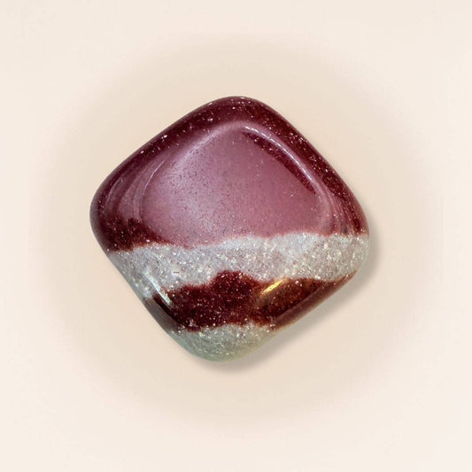 Shiva Lingam Cube tumbled stone with maroon and beige bands, symbolizing sacred balance and vitality in collectible rocks.