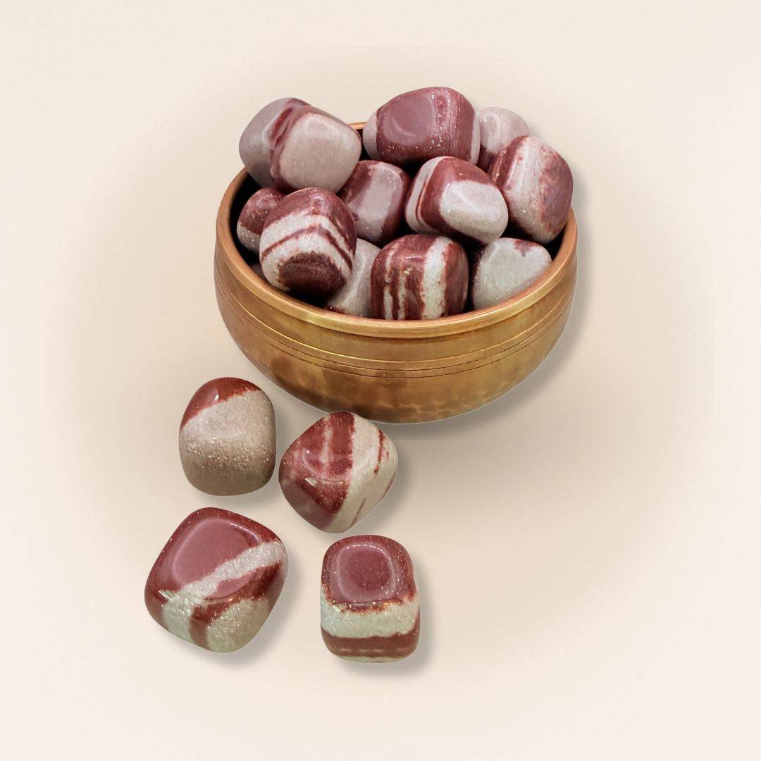 Collection of Shiva Lingam Cube tumbled stones in a wooden bowl, ideal for energy balance and grounding in rock collectibles.