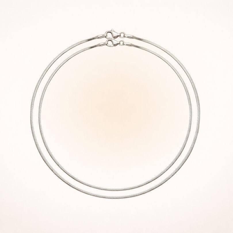 Silver snake chain necklace included in the Path of Prosperity Aligned Pairing, ideal for showcasing the carnelian pendant.