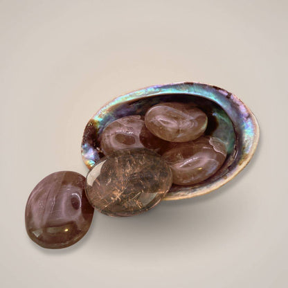 Smoky Quartz palm stones in iridescent shell dish