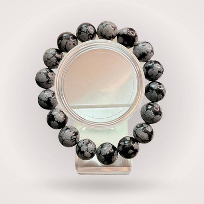 Snowflake Obsidian Bracelet - 12mm Beaded | Grounding, Balance. Handcrafted bracelet with polished 12mm snowflake obsidian beads for energy grounding.