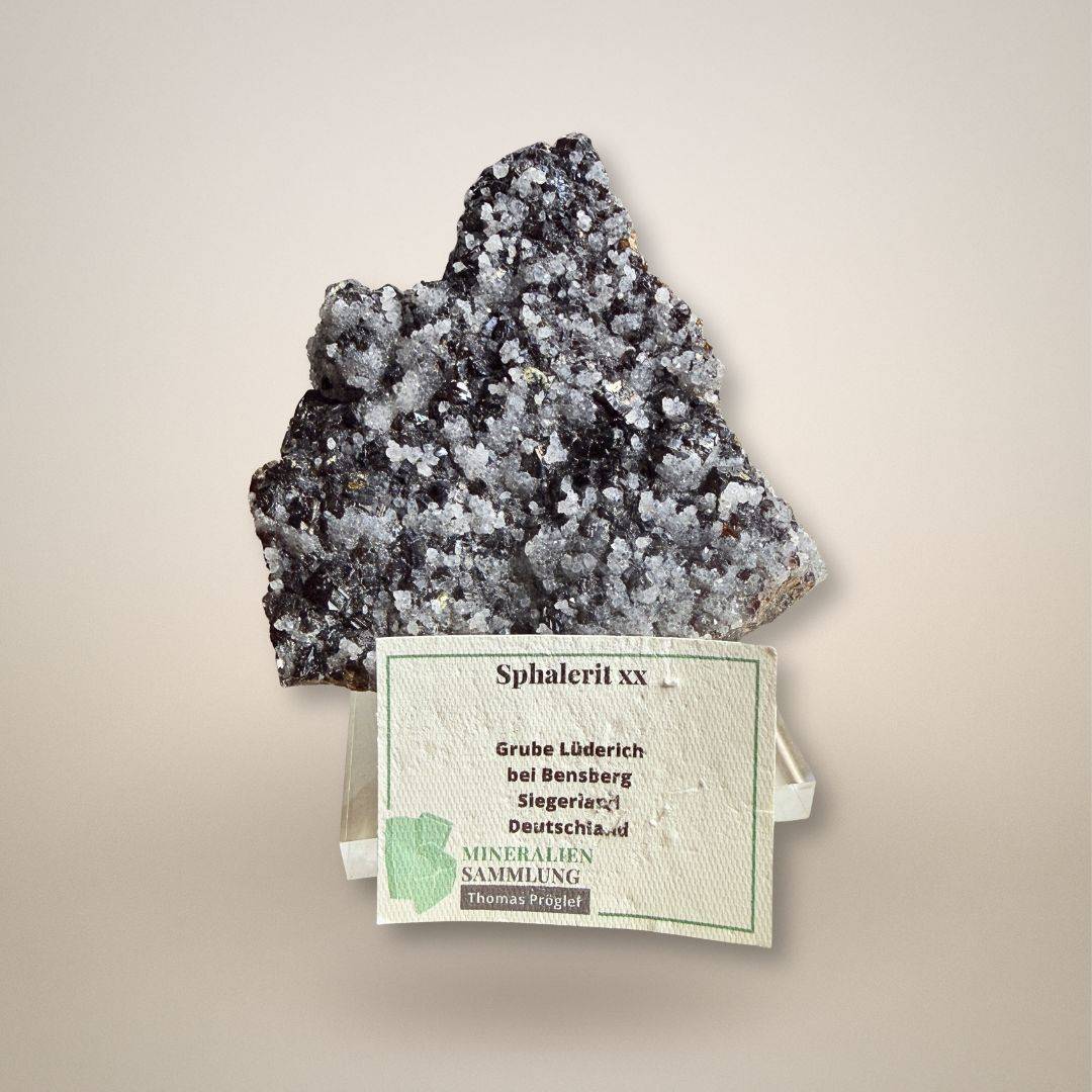 Sphalerite with Quartz specimen from Grube Lüderich, Germany displayed with original mineral collection card. Authentic collectible piece.