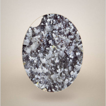 Close-up of Sphalerite with Quartz from Grube Lüderich, Germany, revealing intricate quartz crystal growth over dark sphalerite matrix.