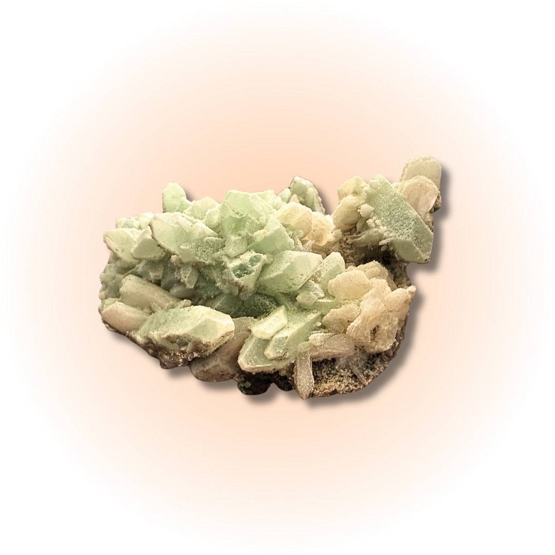 Premium Green Apophyllite Stilbite cluster with sharp green crystals and peachy stilbite, perfect for spiritual alignment and display collections.