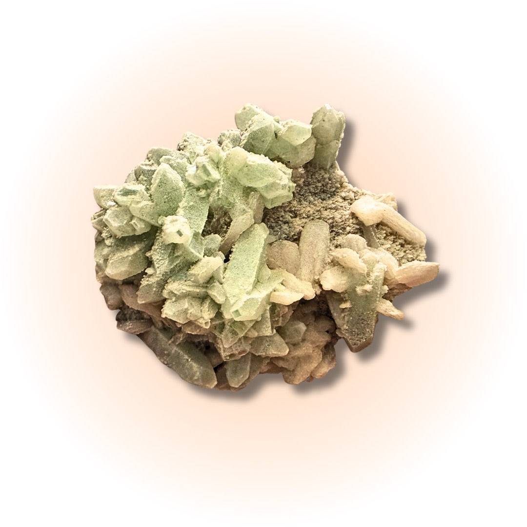 Top view of Green Apophyllite Stilbite crystal cluster highlighting its intricate green and beige crystal formations from Maharashtra, India.
