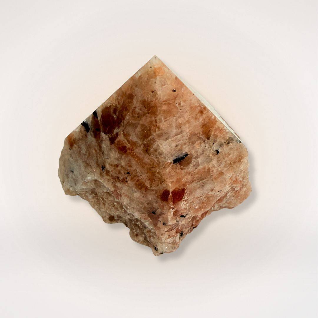 Sunstone top polish natural sided point gemstone with orange and black inclusions, ideal for confidence and vitality crystal collections.