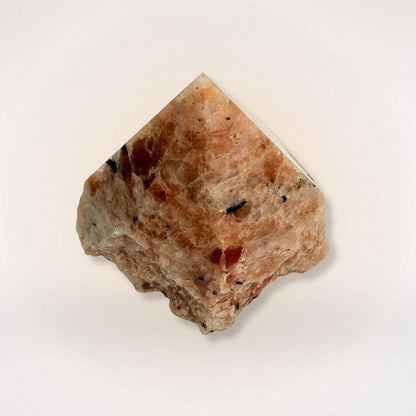 Sunstone top polish natural sided point gemstone with orange and black inclusions, ideal for confidence and vitality crystal collections.