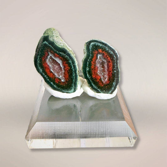 Tabasco Agate micro-geode pair on acrylic stand for collectibles