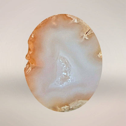 Tabasco agate micro-geode pair with display stand and background