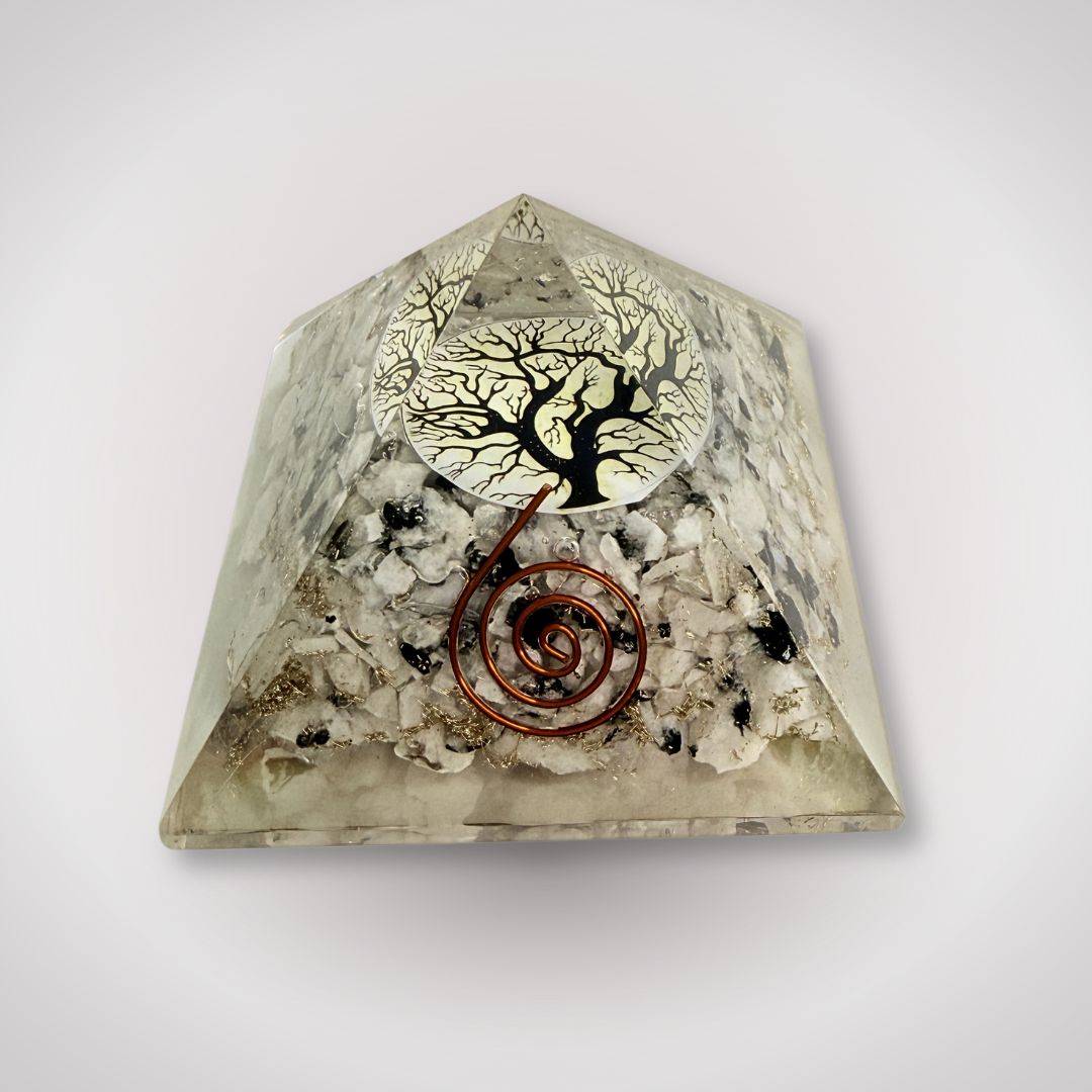Front angle of Tree of Life Orgonite Pyramid showcasing embedded copper coil and quartz crystals for energy balance and home decoration.