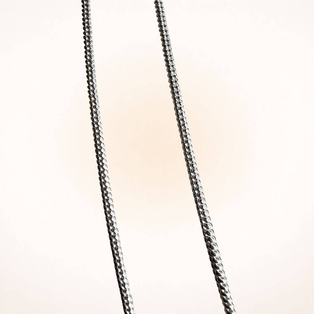 Close-up of Silver Plated Wheat Chain Necklace showing intricate wheat chain texture and durable silver plating.