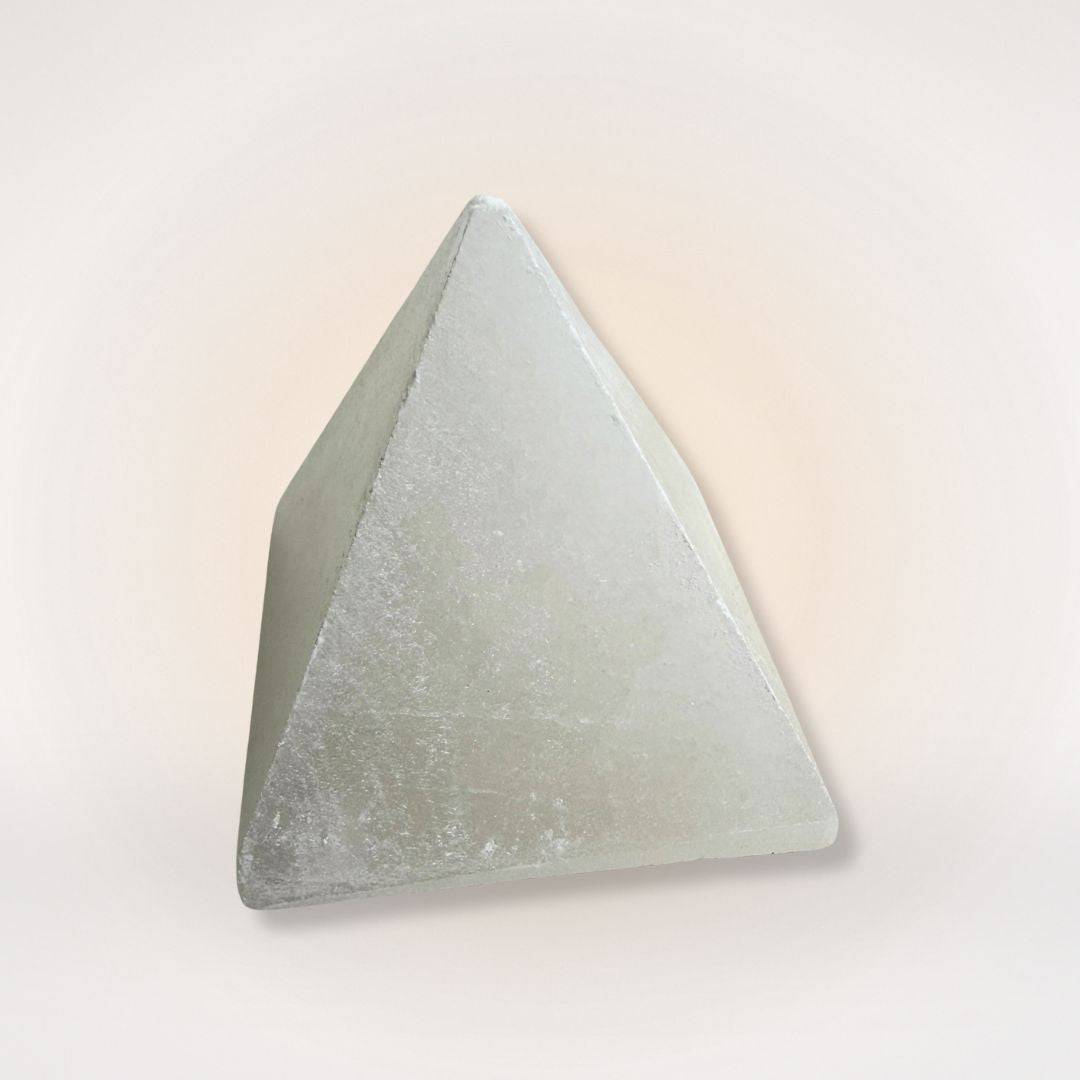 Polished White Selenite Pyramid from Morocco, known for energy amplification and clarity, perfect for serene home and garden figurine displays.