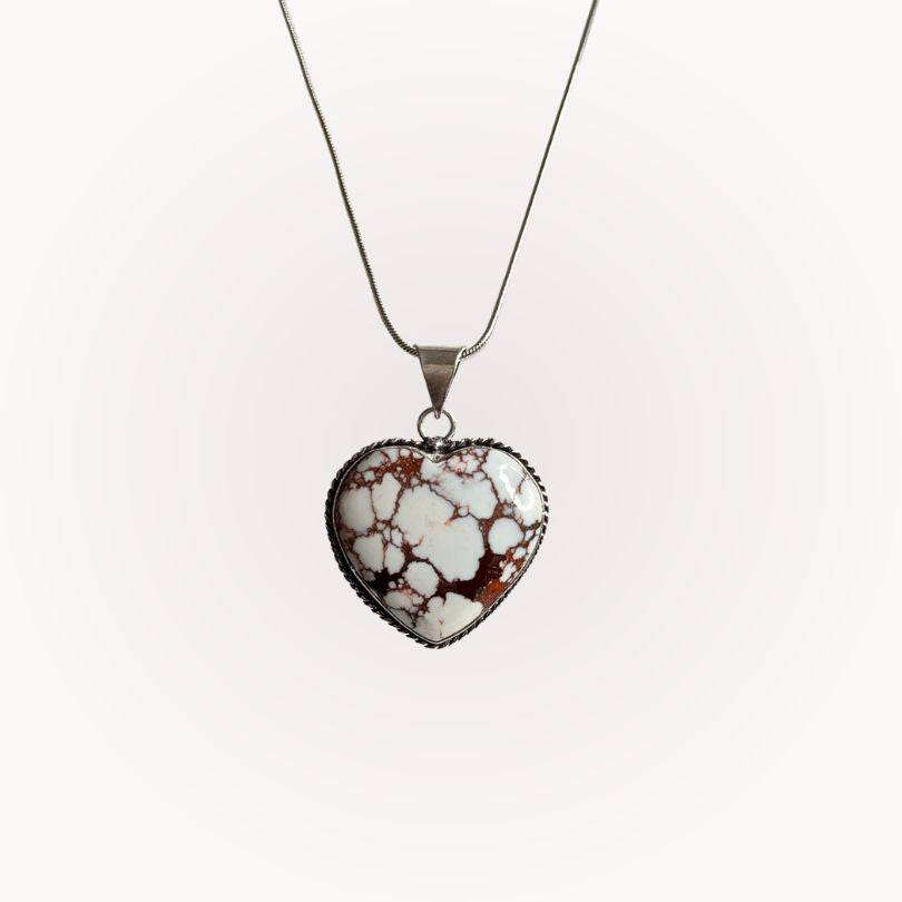 Wild Horse Jasper Heart Pendant with silver-plated rope bezel, showcasing grounding energy and strength in a polished stone design.