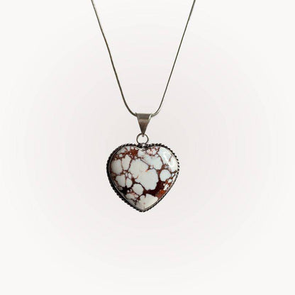 Wild Horse Jasper Heart Pendant with silver-plated rope bezel, showcasing grounding energy and strength in a polished stone design.