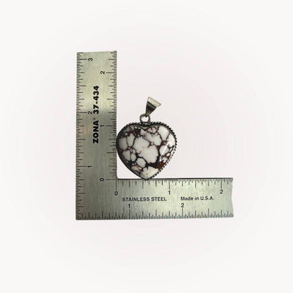 Wild Horse Jasper Heart Pendant shown with ruler for scale, emphasizing its size and grounding energy in a heart-shaped design.