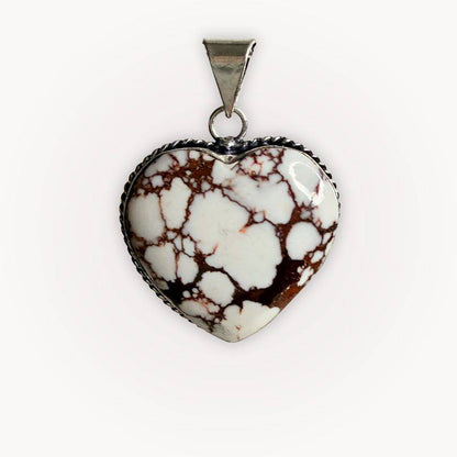 Close-up of Wild Horse Jasper Heart Pendant with bold brown and white patterns, symbolizing calm strength and grounding energy.