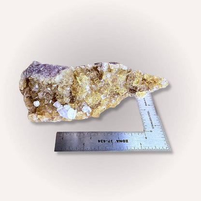 Yellow & clear fluorite specimen from Ojuela Mine placed next to a ruler for scale, weighing 520 g and ideal for display or study.