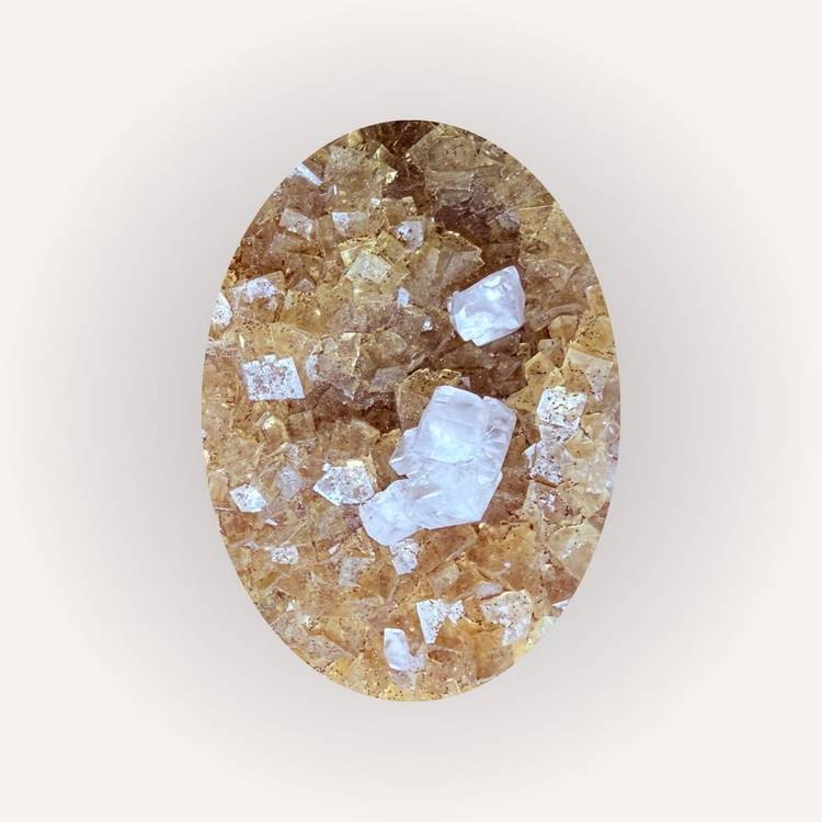 Close-up of yellow and clear fluorite crystals with cubic structure and high clarity, highlighting the specimen’s intricate details.