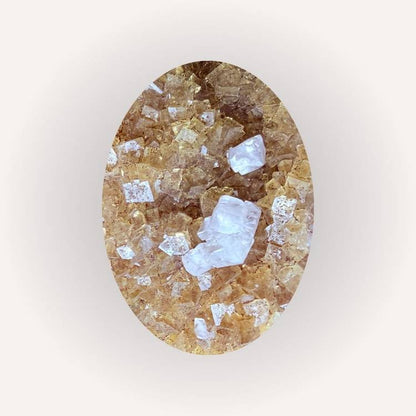 Close-up of yellow and clear fluorite crystals with cubic structure and high clarity, highlighting the specimen’s intricate details.