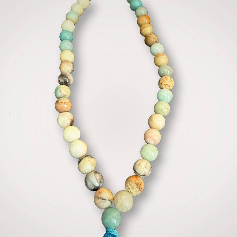 Close-up of Amazonite Mala Necklace for Calm showing natural stone textures and 108 beads, used for meditation and emotional healing.