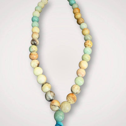 Close-up of Amazonite Mala Necklace for Calm showing natural stone textures and 108 beads, used for meditation and emotional healing.