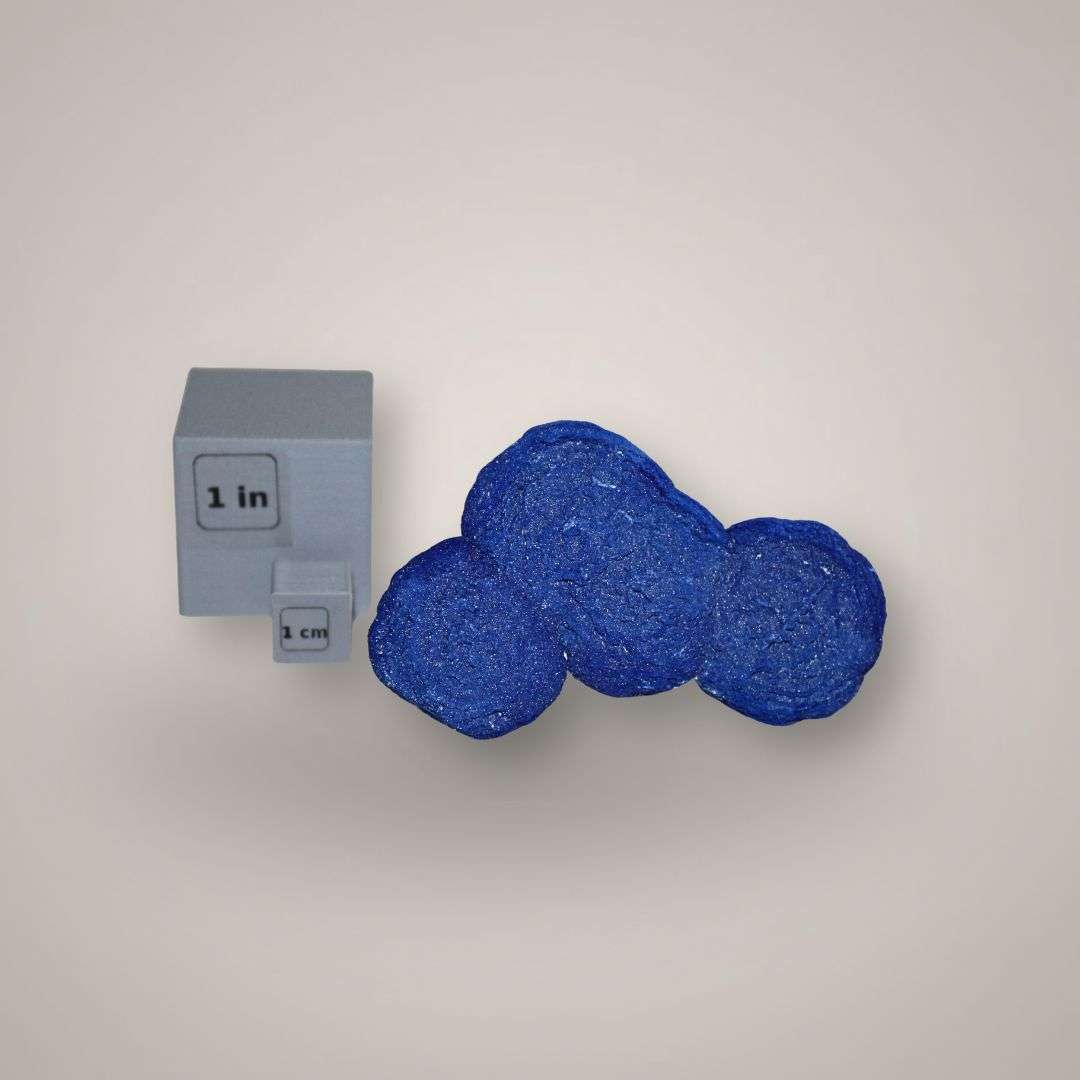 Scale view of four connected Azurite Suns from Australia beside one-inch mineral scale cubes.
